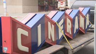 Iconic Cinerama sign comes down as theater takes first step toward reopening with new name