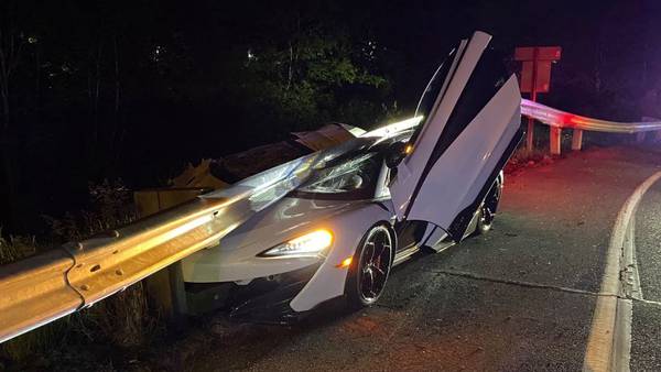 High-priced sports car ends up under guardrail after Tacoma hit-and-run crash