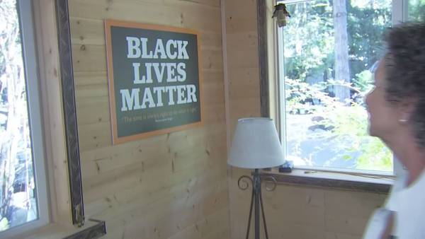 VIDEO: Olympia woman faces fines for sign inside her home