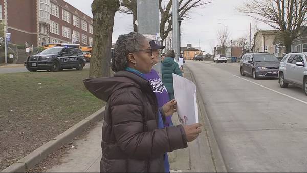Students, parents rally outside of Garfield High School to end gun violence
