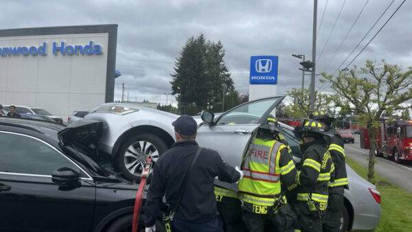 Driver in serious condition after her car crashes into Lynnwood car dealership