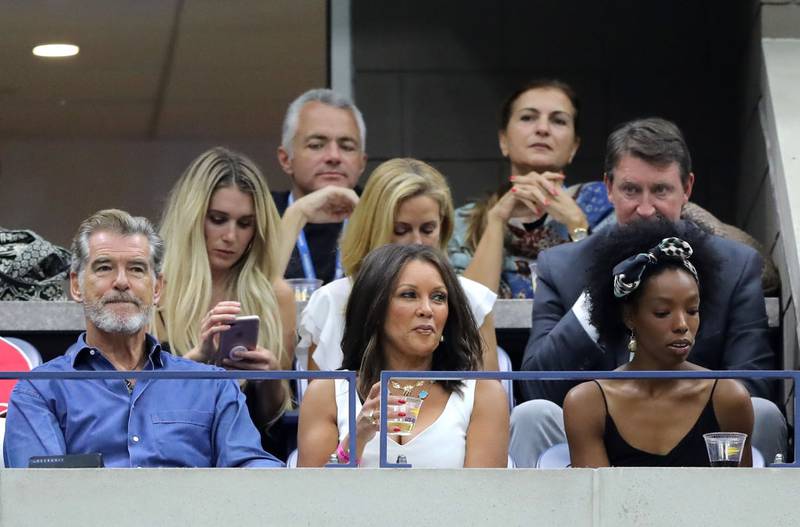 NEW YORK, NY - SEPTEMBER 08:  Actor Pierce Brosnan and singer Vanessa Williams look on during the Women's Singles finals match between Serena Williams of the United States and Naomi Osaka of Japan on Day Thirteen of the 2018 US Open at the USTA Billie Jean King National Tennis Center on September 8, 2018 in the Flushing neighborhood of the Queens borough of New York City.  (Photo by Elsa/Getty Images)