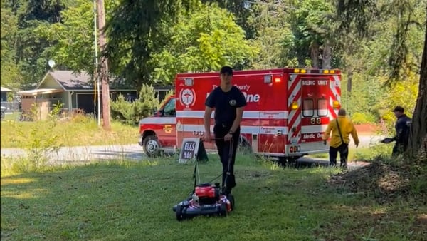 Emergency call ends with a mowed lawn in East Olympia