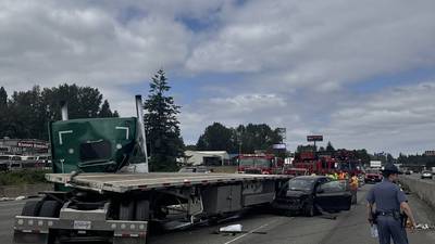 Photos: A jackknifed semi delays traffic on I-5 in Fife