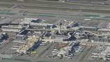 Police: passenger pulled jet’s emergency slide at LA airport