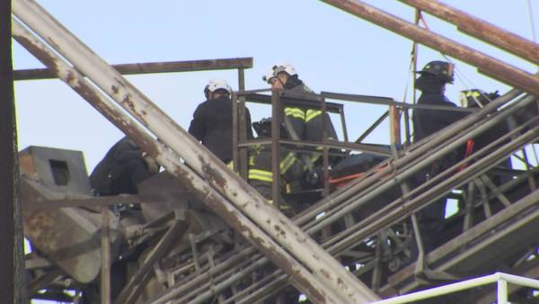 Seattle firefighters rescue worker pinned on conveyer belt