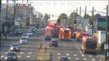 Car crashes into Seattle lumber building, injuring two