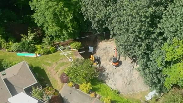 VIDEO: Crews working to recover bodies after trench collapse