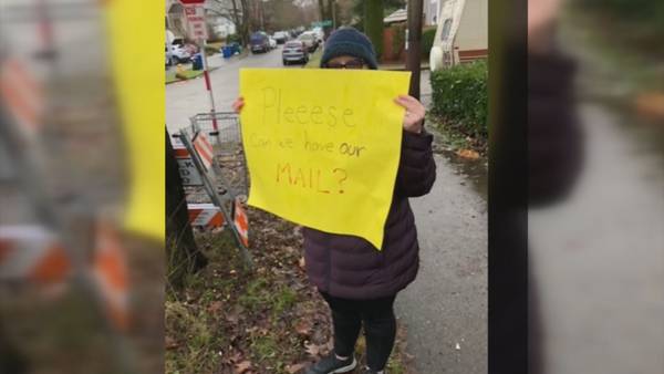 Frustrated couple pickets Wallingford post office to try to get mail delivered