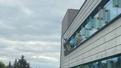 PHOTOS: Superhero window washers at Seattle Children's