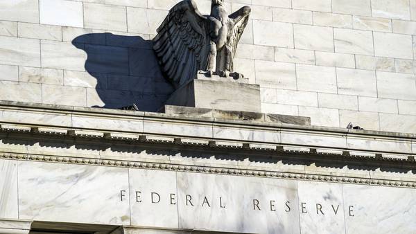 Federal Reserve cuts rates by half-point, marking end to fight with inflation