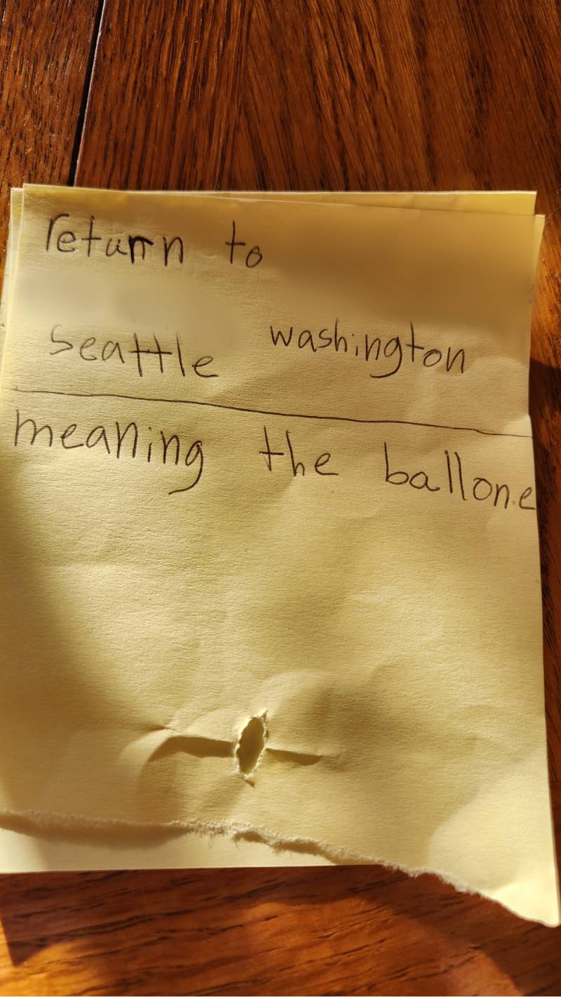 The note attached to the balloon