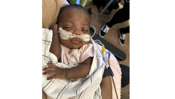 `Micropreemie' baby who weighed just over 1 pound at birth goes home from Illinois hospital