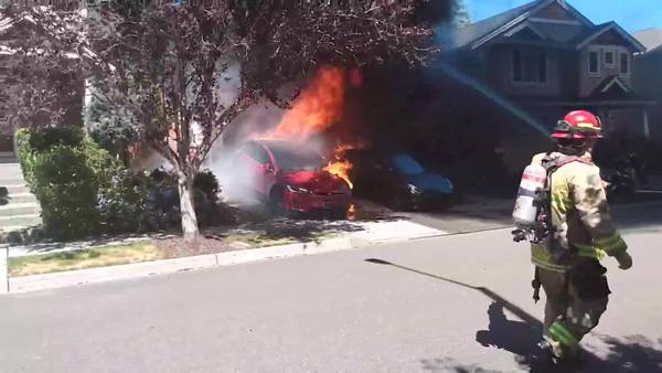 RAW: Garage full of ammunition ignites Tesla in Lynnwood neighborhood