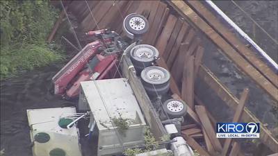 Bridge collapse sends dump truck into Snohomish County creek