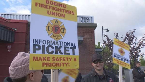 Boeing threatens to lock out its private firefighters around Seattle in a dispute over pay