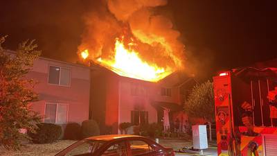 PHOTOS: Fire damages homes in Kent