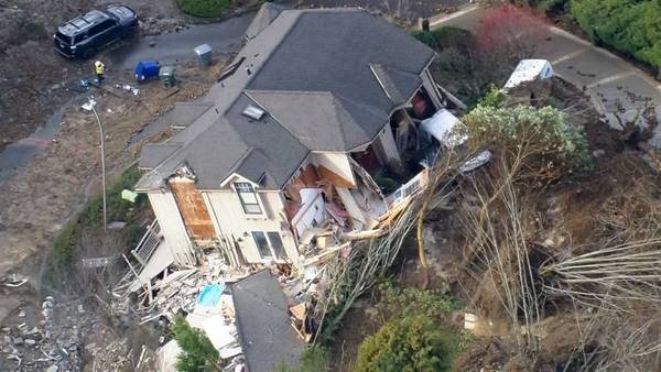 VIDEO: Water main break, landslide causes house to slide, collapse