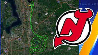 NJ Devils fan draws logo with plane over Western Washington
