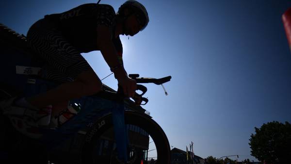 Motorcycle rider dies after crashing with cyclist during Ironman event in Germany 