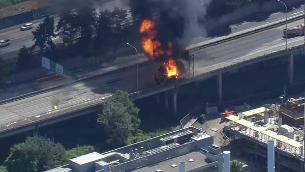 RAW: Explosions seen during chemical truck fire on I5