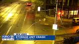 Car crashes into storage building in Seattle