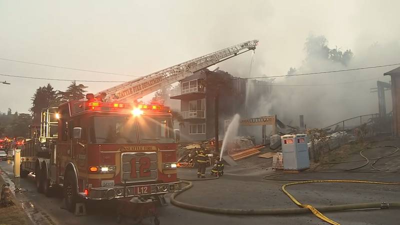 A 3-alarm fire caused a home under construction to collapse and damaged two others in Seattle's Mount Baker neighborhood.