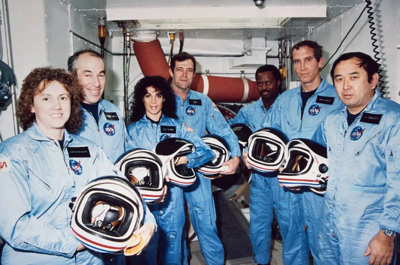 NASA lost seven of its own on the morning of Jan. 28, 1986, when a booster engine failed, causing the Shuttle Challenger to break apart just 73 seconds after launch. In this photo from Jan. 9, 1986, the Challenger crew takes a break during countdown training at NASA's Kennedy Space Center.