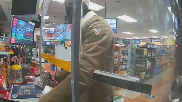Tacoma business owner shares story after being robbed at gunpoint inside her convenience store