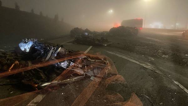 Junk cars spill across southbound I-5 in Tacoma