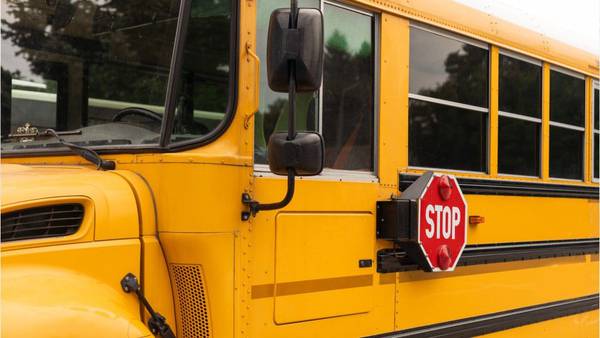 Bus driver accused of closing bus's doors on parent