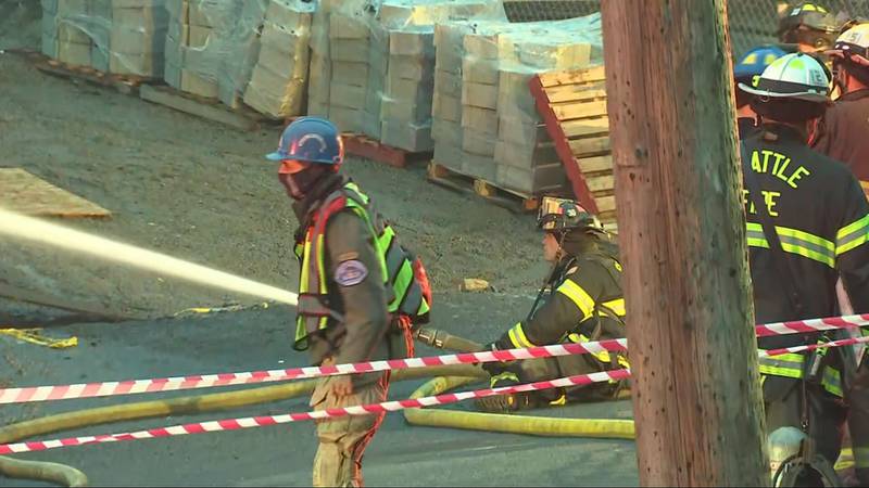 A 3-alarm fire caused a home under construction to collapse and damaged two others in Seattle's Mount Baker neighborhood.