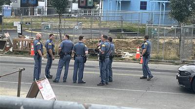 Photos: Police chase runaway truck carrying 4-year-old down I-5 in Seattle