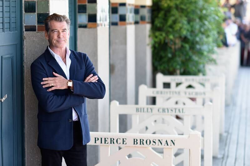 DEAUVILLE, FRANCE - SEPTEMBER 12:  Pierce Brosnan unveils his cabin sign as a tribute for his career along the promenade des planches during the 40th Deauville American film festival on September 12, 2014  in Deauville, France.  (Photo by Pascal Le Segretain/Getty Images)