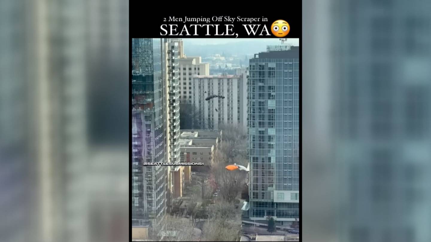 视频展示了跳伞者在西雅图摩天大楼上的大胆跳跃