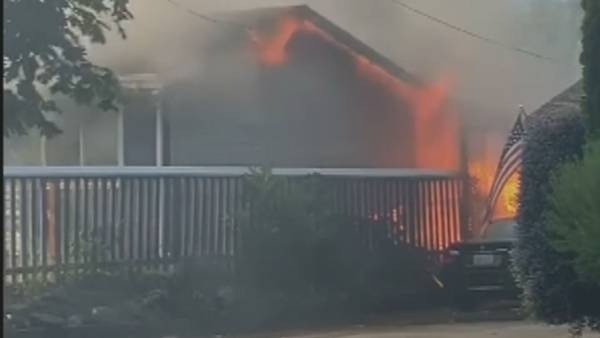 VIDEO: Woman saved from burning Renton home