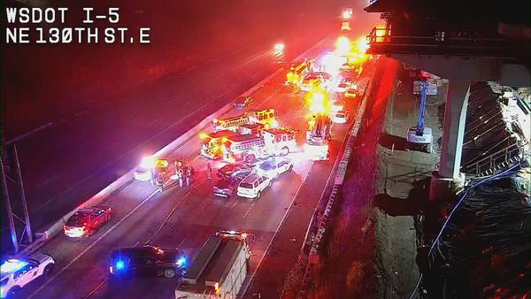 Driver comes off overpass, crashes into two vehicles on I-5 near Northgate; near 8-hour closure