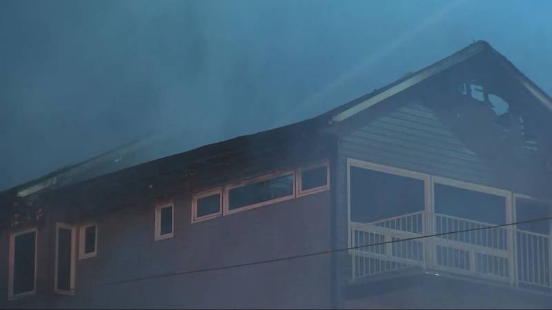 A 3-alarm fire caused a home under construction to collapse and damaged two others in Seattle's Mount Baker neighborhood.