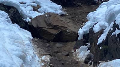 PHOTOS: Rockslide, huge boulder at White Pass
