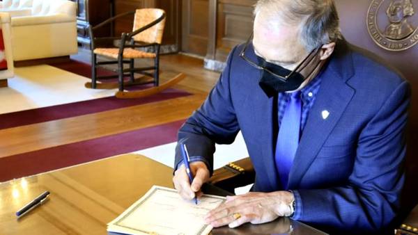 VIDEO: Inslee signs into law the delay of long-term care program