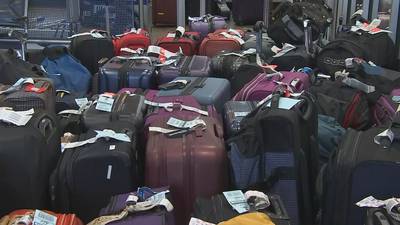 Travelers turn to GPS trackers as lost luggage continues to clog Sea-Tac Airport