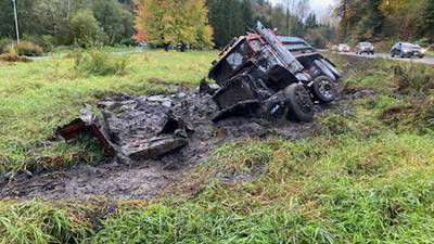 PHOTOS: Dump truck in the mud