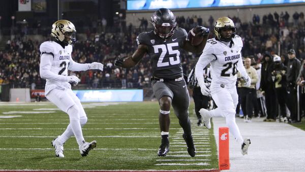 Ward leads Washington State to 56-14 romp over Colorado; Sanders exits with injury