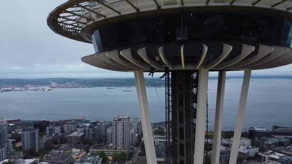 RAW: Glass under Space Needle floor being washed for first time