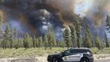 Fires threaten towns, close interstate in Pacific Northwest as heat wave continues