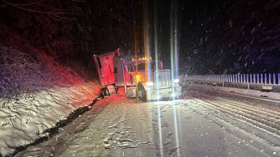 PHOTOS: Ice, snow cause spinouts that close Highway 18