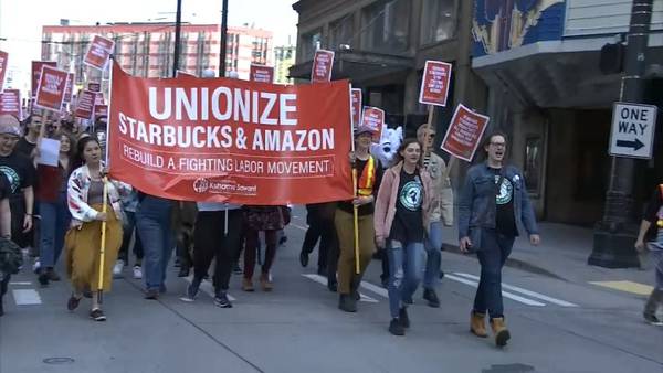 Hundreds march through downtown Seattle to support newly unionized Starbucks employees
