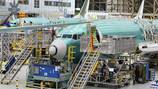 Boeing says it has a deal to avoid a strike by more than 30,000 machinists