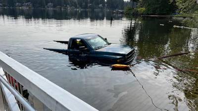 Photos: Truck falls into lake at Black Diamond boat launch