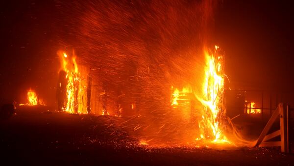 PHOTOS: Fast moving fires prompt mandatory evacuations in California